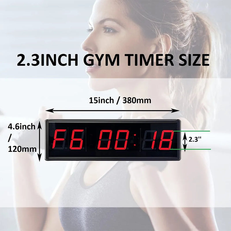 A 2.3-inch rectangular digital gym timer shown with size annotations over a blurred background of a woman.