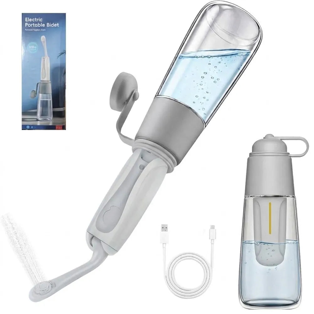 Electric portable bidet shower device with a gray and clear water tank, shown with its USB charging cable, a water bottle, and the retail box on a white background.