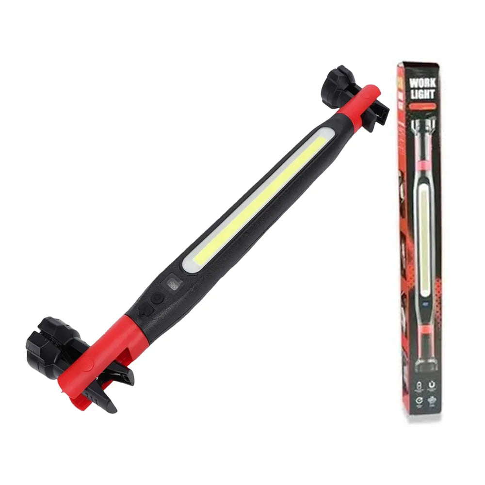 A red and black multi-tool work light with an integrated LED strip, shown alongside its retail packaging box on a plain white background.