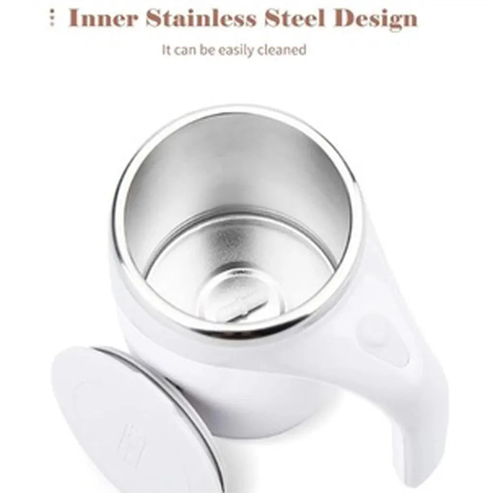 Stainless steel cup with white handle on a white background