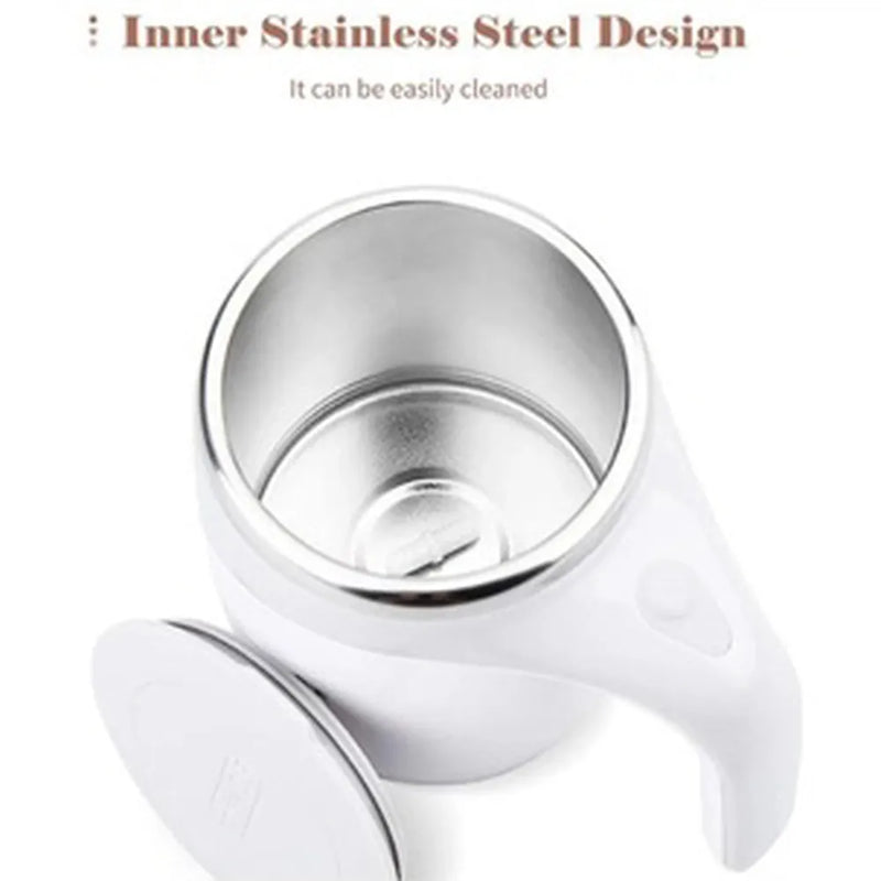 Stainless steel cup with white handle on a white background