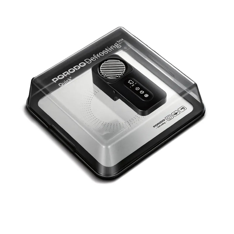 A portable coffee decafifier machine by PORODO, enclosed in its clear plastic retail packaging box with a black base and white branding, shown on a white background.