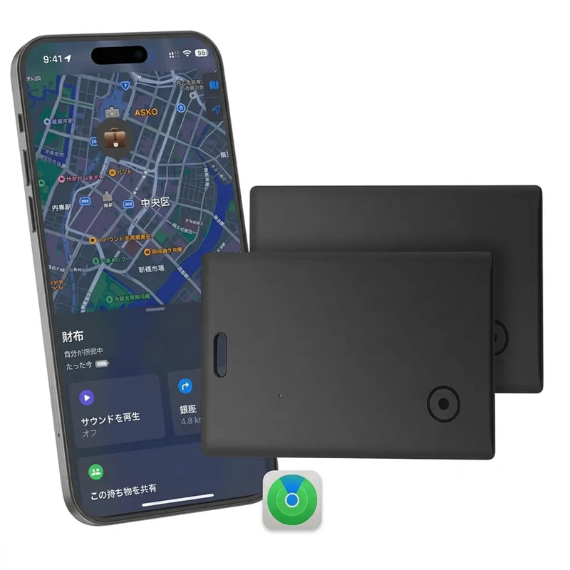 Two black rectangular electronic accessories shown in front of a smartphone screen displaying a map app, with a small green and blue circular icon below. The phone appears to demonstrate compatibility or use context, but the main sold items are the two black devices.